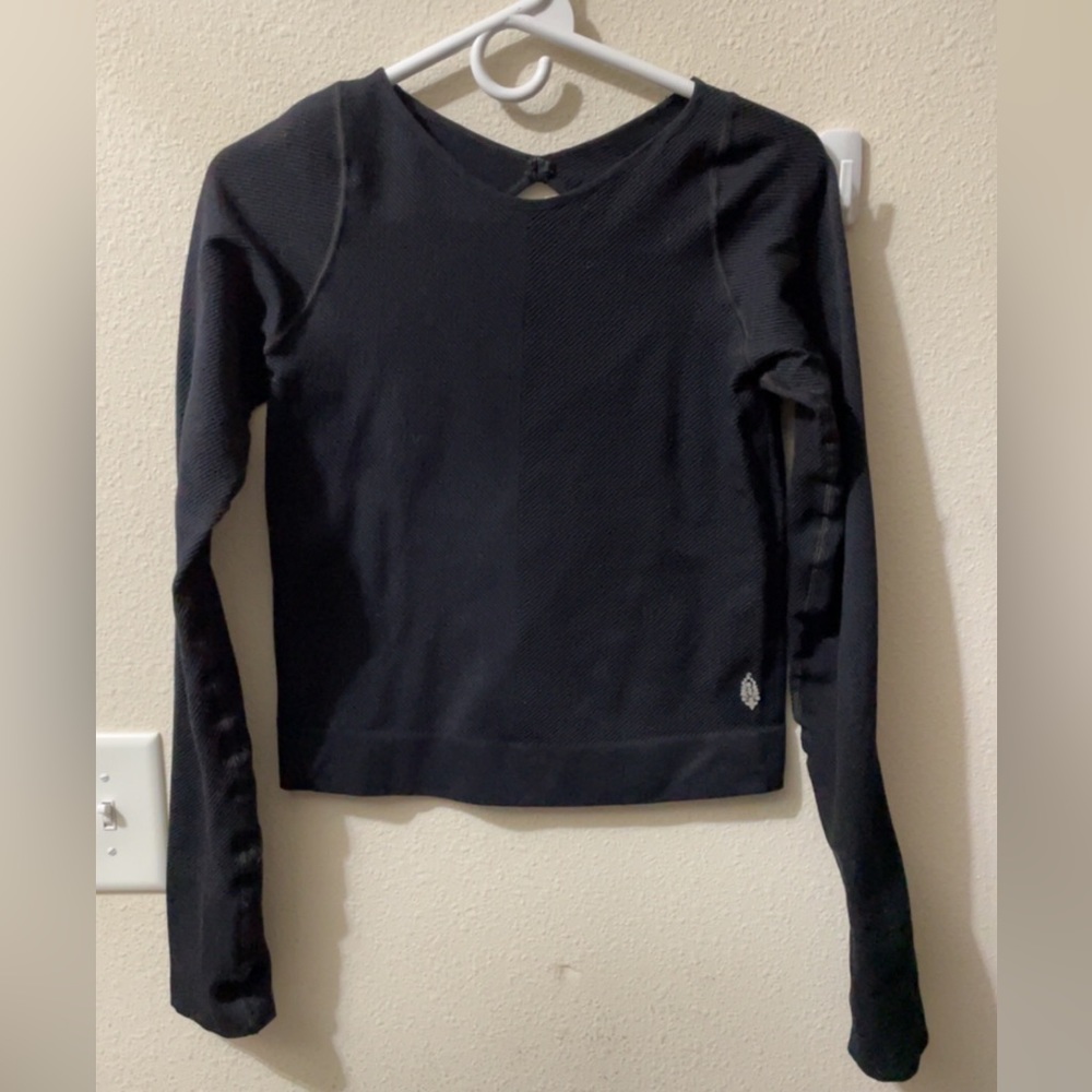 FP movement easy free throw layer top. Size M/L